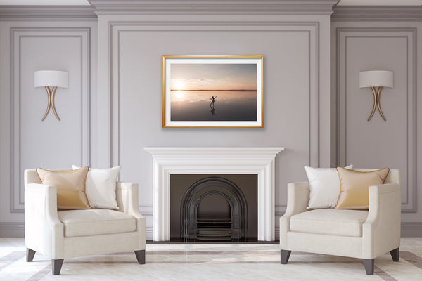 Ballerina on the Salt Lake at Sunset hanging in a living room